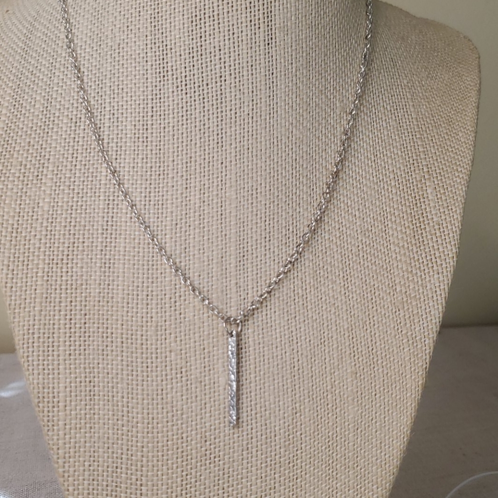 Silver plated necklace with bar charm.